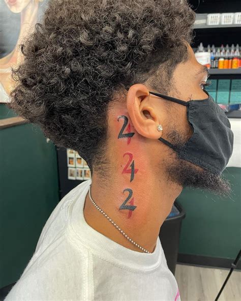 Angel number neck tattoo